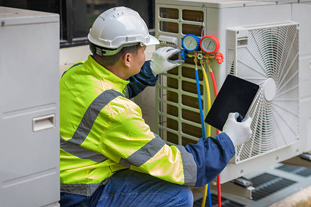 Professional Hvac technician working in Elfers, FL
